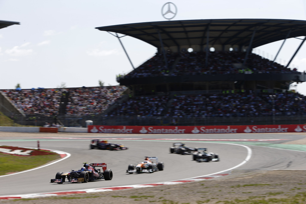 Daniel Ricciardo and Paul Di Resta during the 2013 German F1 Grand Prix