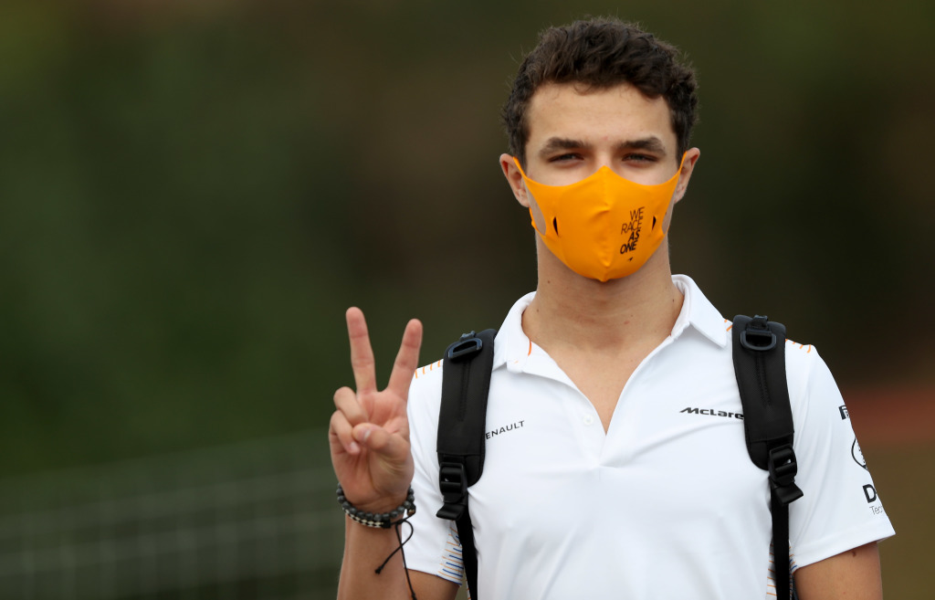 F1 driver Lando Norris wearing a face mask