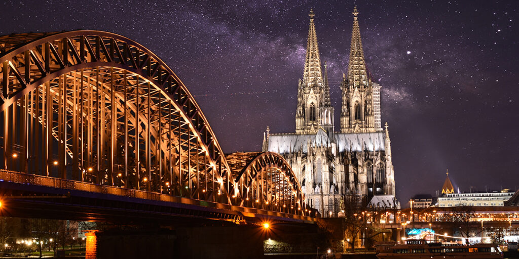 The cathedral in Cologne overlooking the city at night
