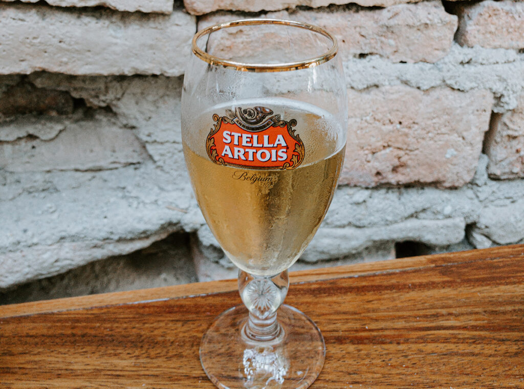 A glass of Stella Artois beer.