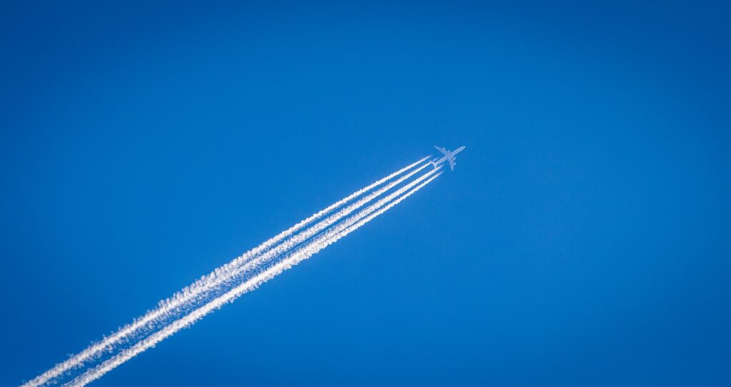 A plane in a blue sky