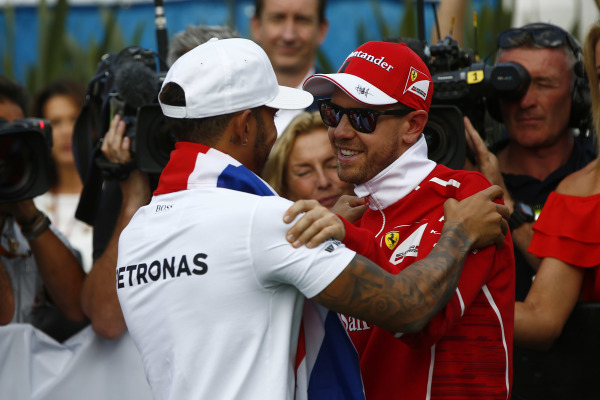 Sebastian Vettel congratulates Lewis Hamilton