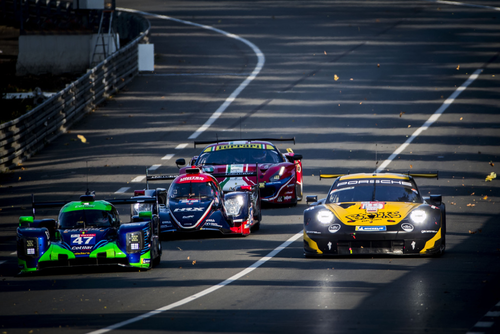Four cars on track during Le Mans.