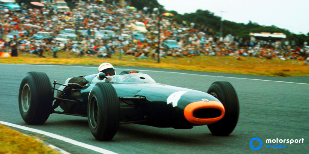Jackie Stewart races a Formula 1 car