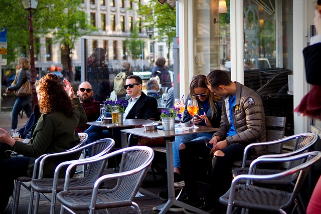 People at a coffee shop in Amsterdam