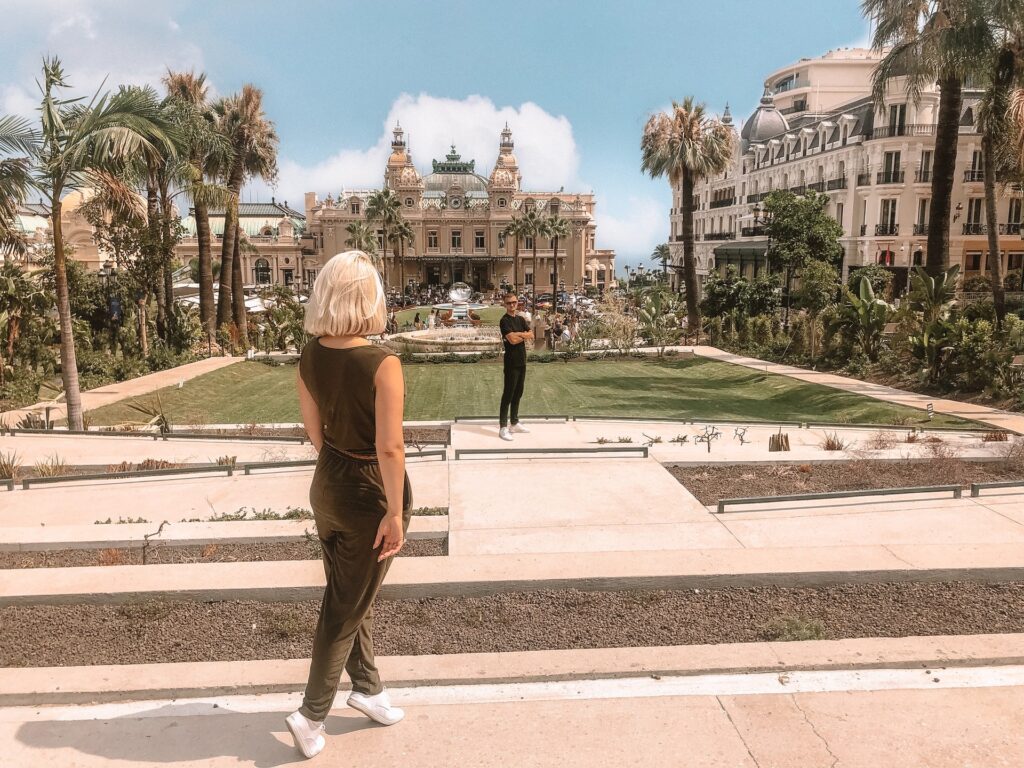 Two people outside a Casino in Monaco