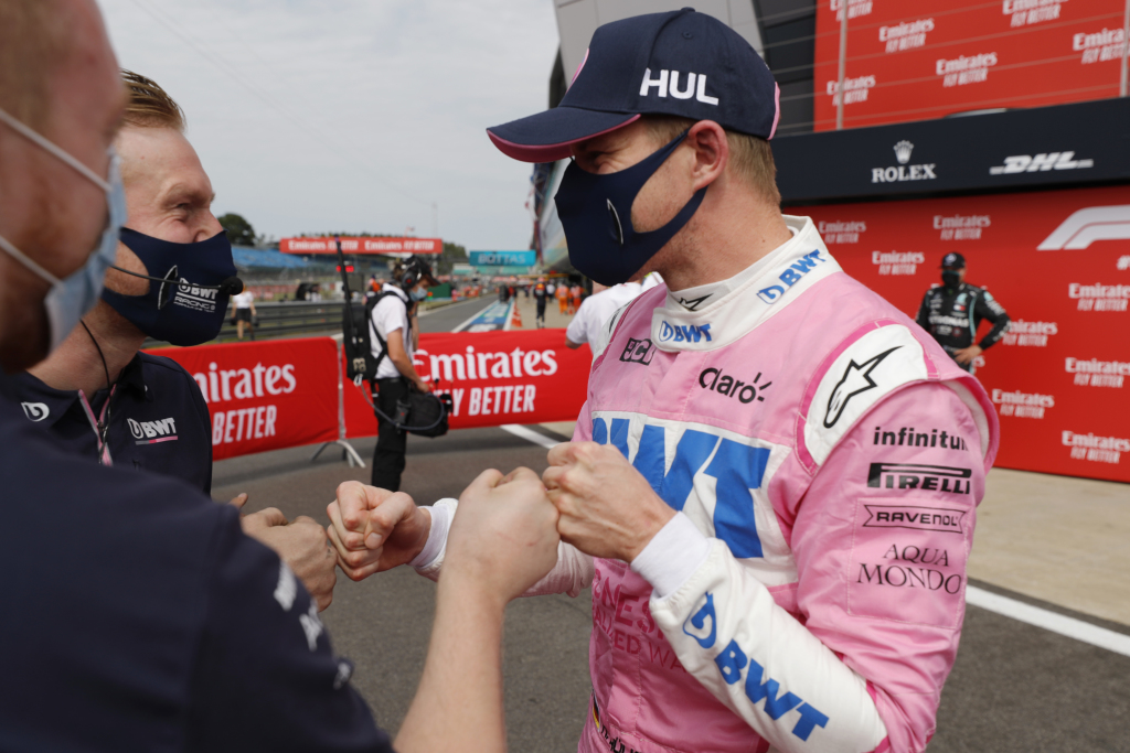 Nico Hulkenberg fist bumps his team