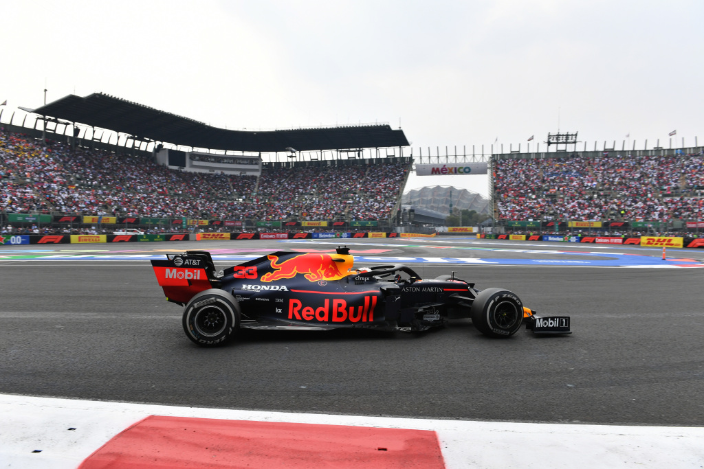 A Formula 1 car passes the grandstands at the Mexico Grand Prix