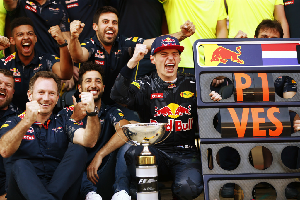 Max Verstappen celebrating his maiden win in Spain with his teammates