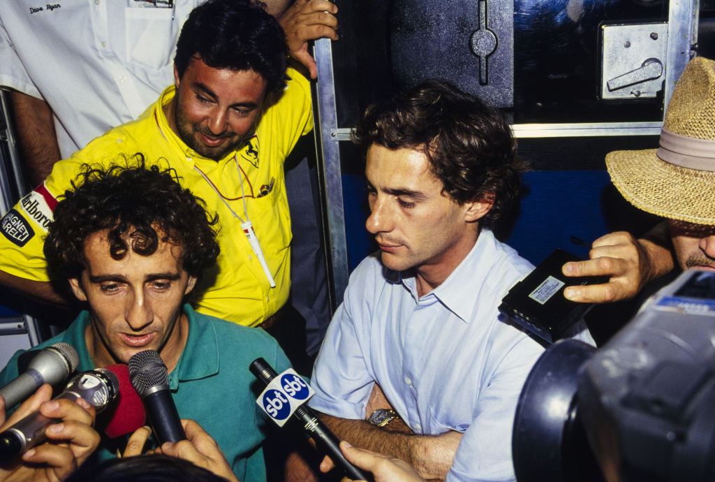 Alain Prost and Ayrton Senna talk to the press