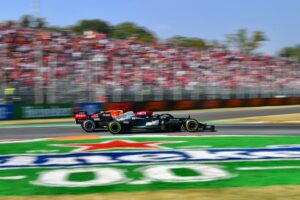 Lewis Hamilton and Max Verstappen racing F1 cars