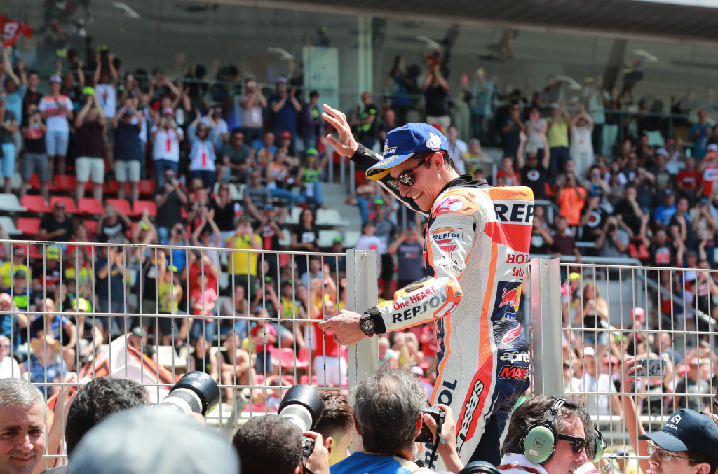 Marc Marquez waves to fans in Barcelona