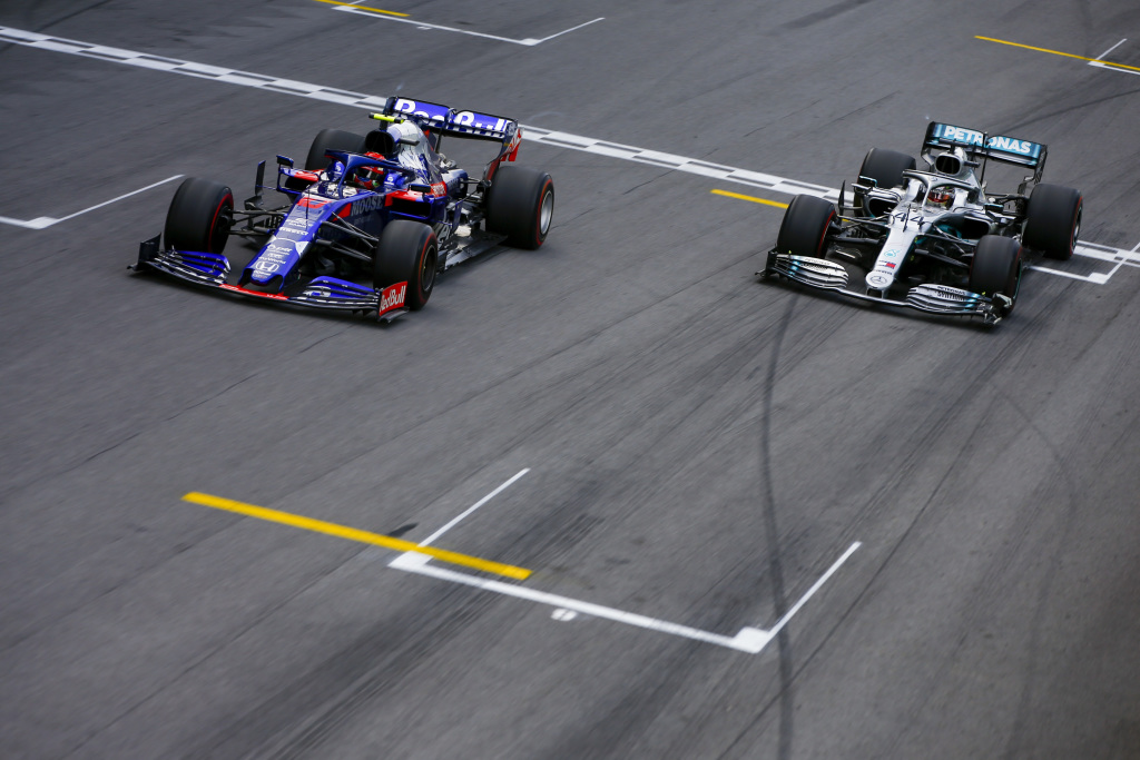 Pierre Gasly and Lewis Hamilton race at the 2019 Brazilian Grand Prix