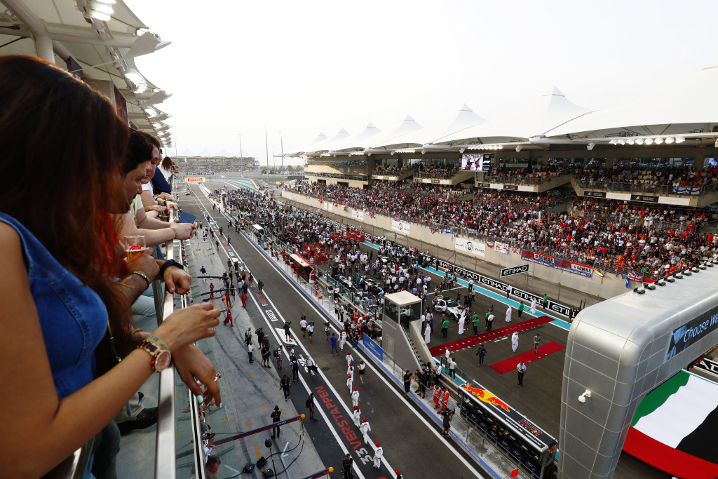 Fans watch preparations for a Grand Prix race