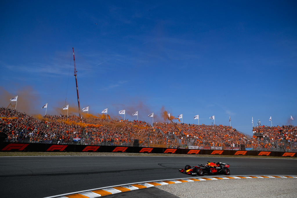 Max Verstappen drives at Circuit Zandvoort as fans wave flares