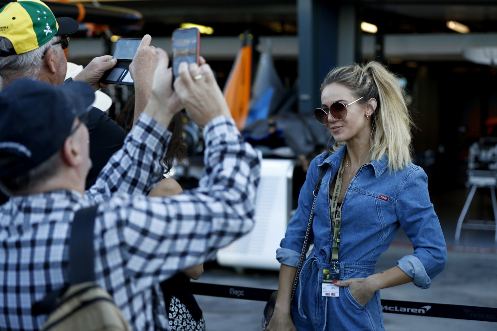 Fans taking photos in the Paddock