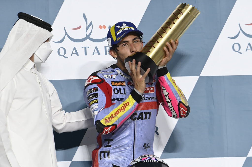 MotoGP rider Enea Bastianini with the winner's trophy