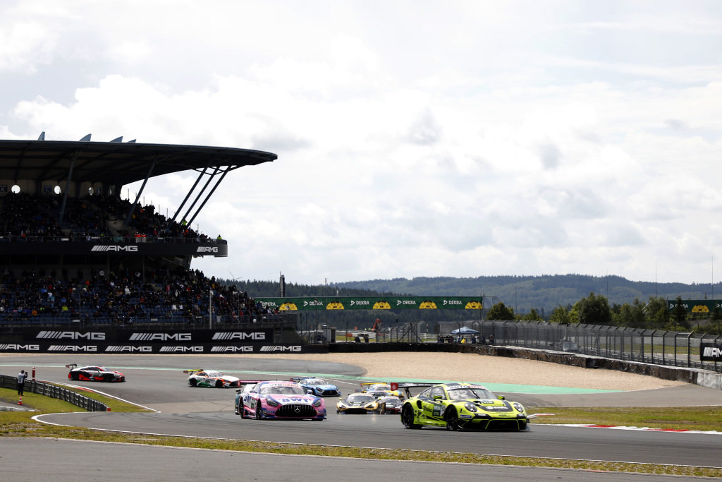 DTM cars race each other in Germany