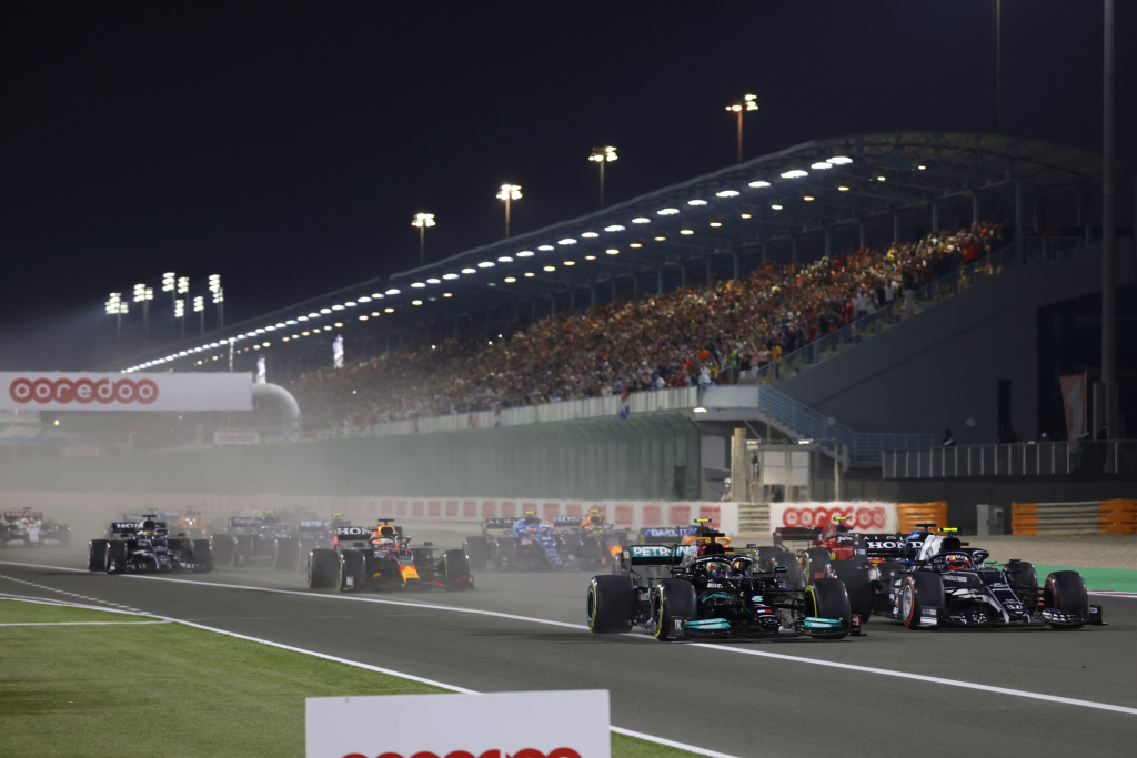 Formula 1 cars start a race at Losail International Circuit