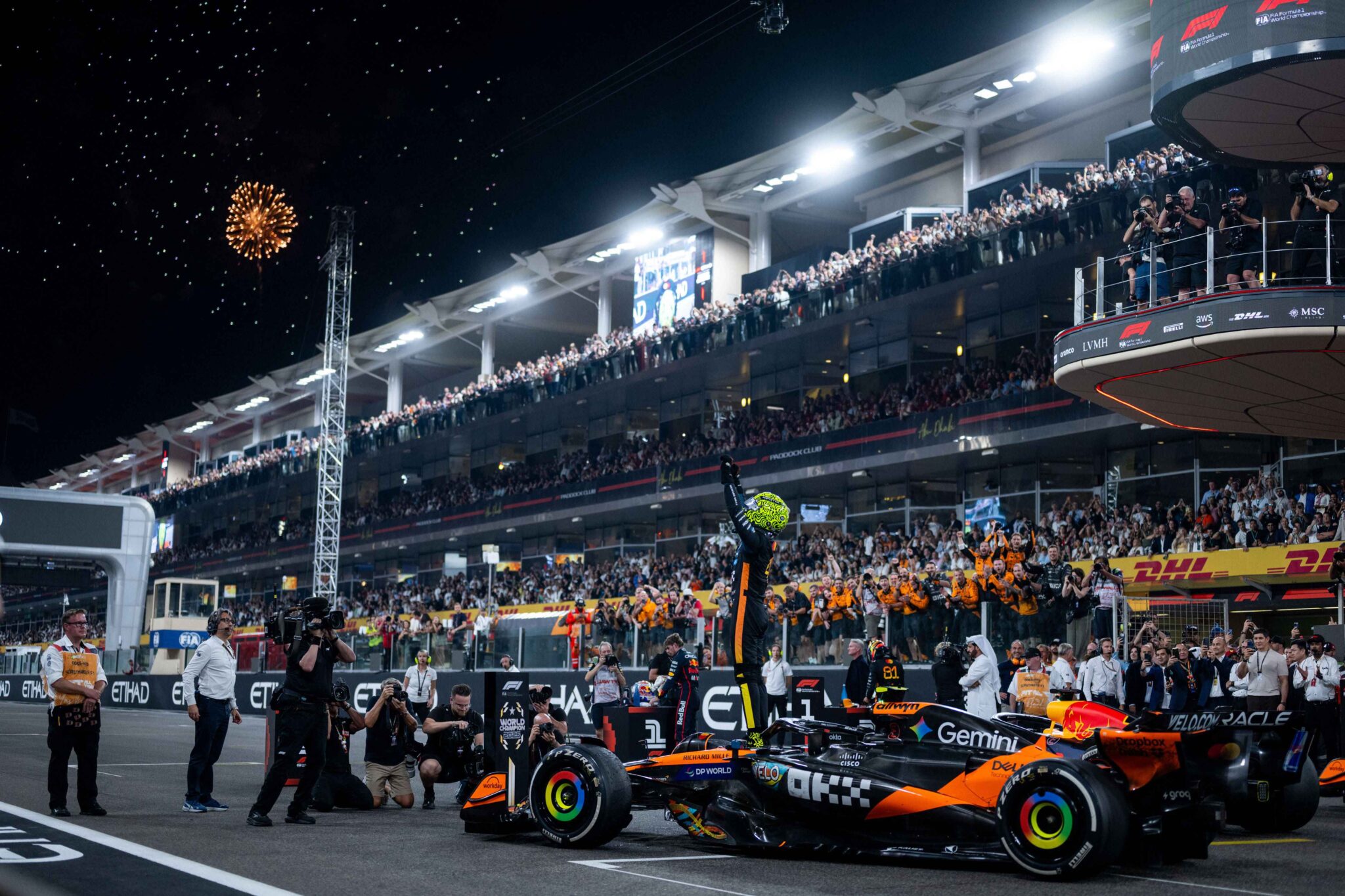 Lando Norris celebrates in Abu Dhabi