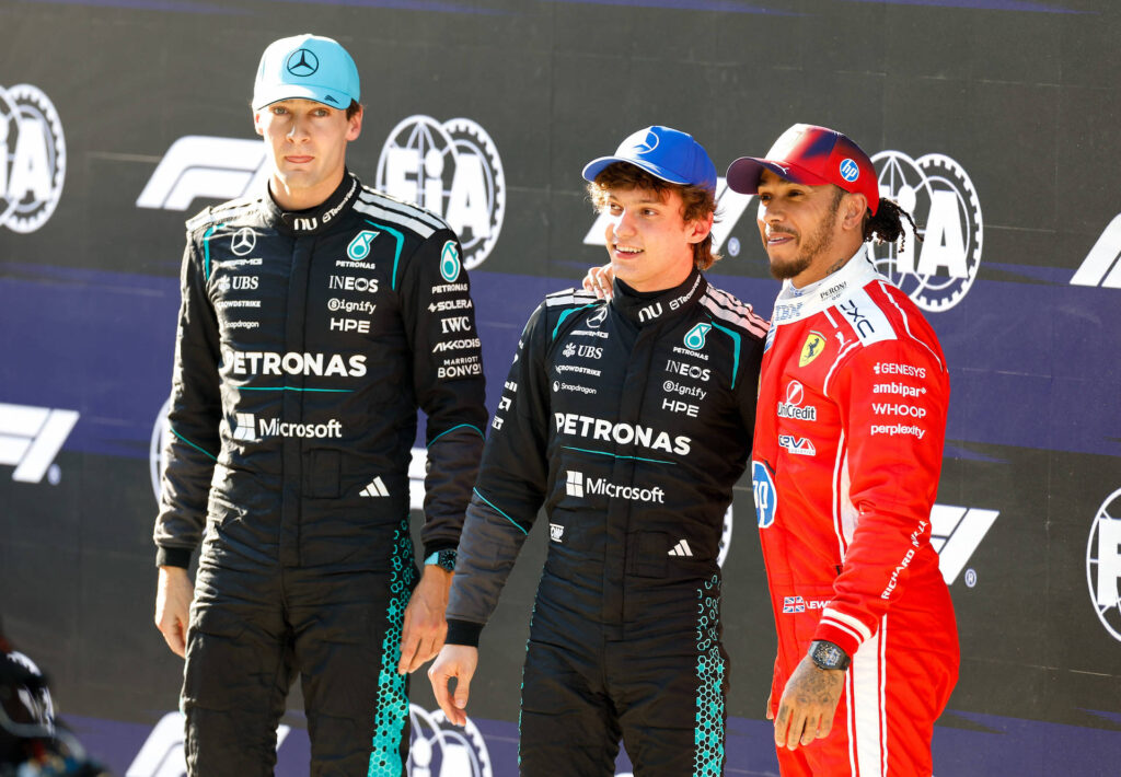 Kimi Antonelli celebrates pole position with Russell and hamilton